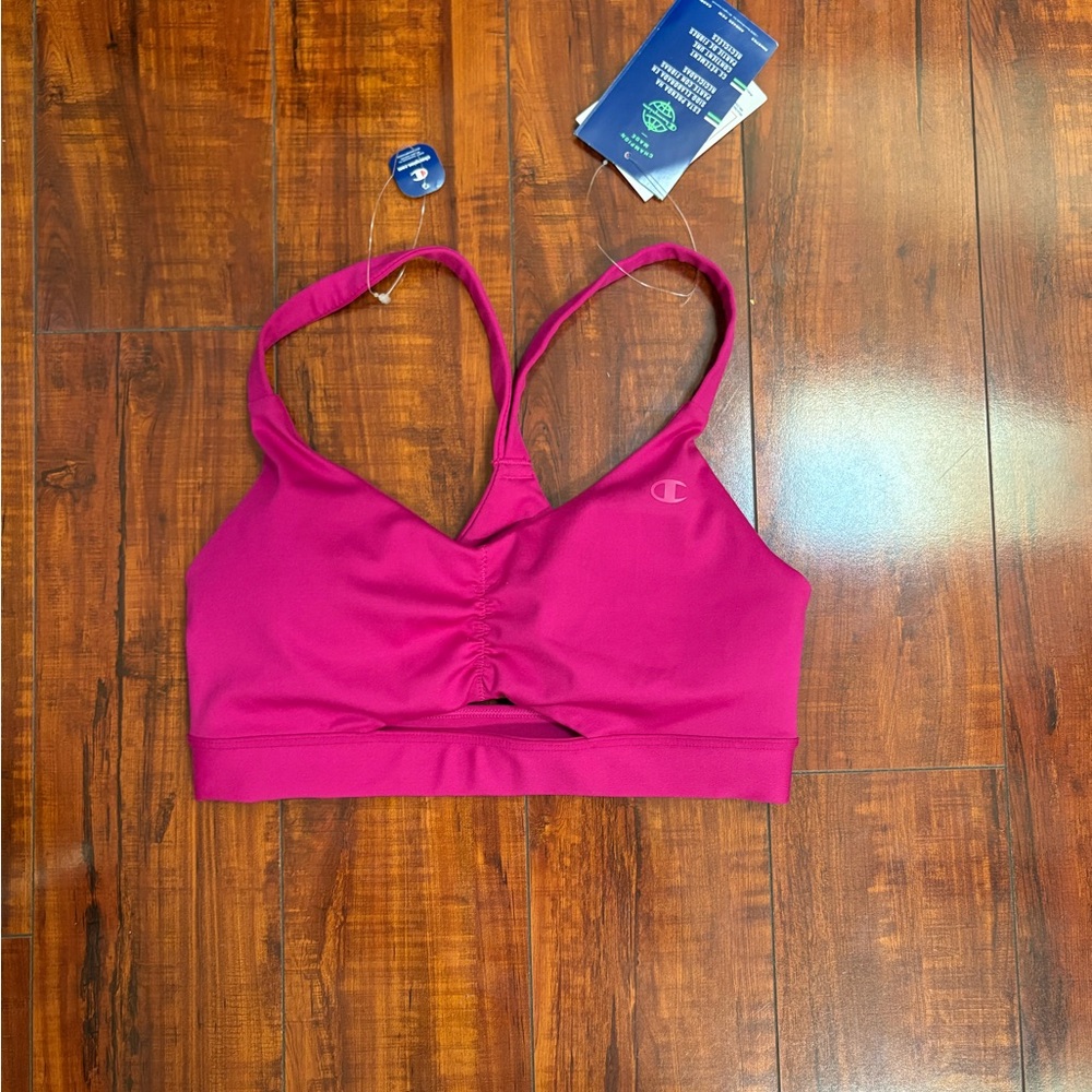 Champion Pink Sports Bra with Racerback and Moisture-Wicking Fabric